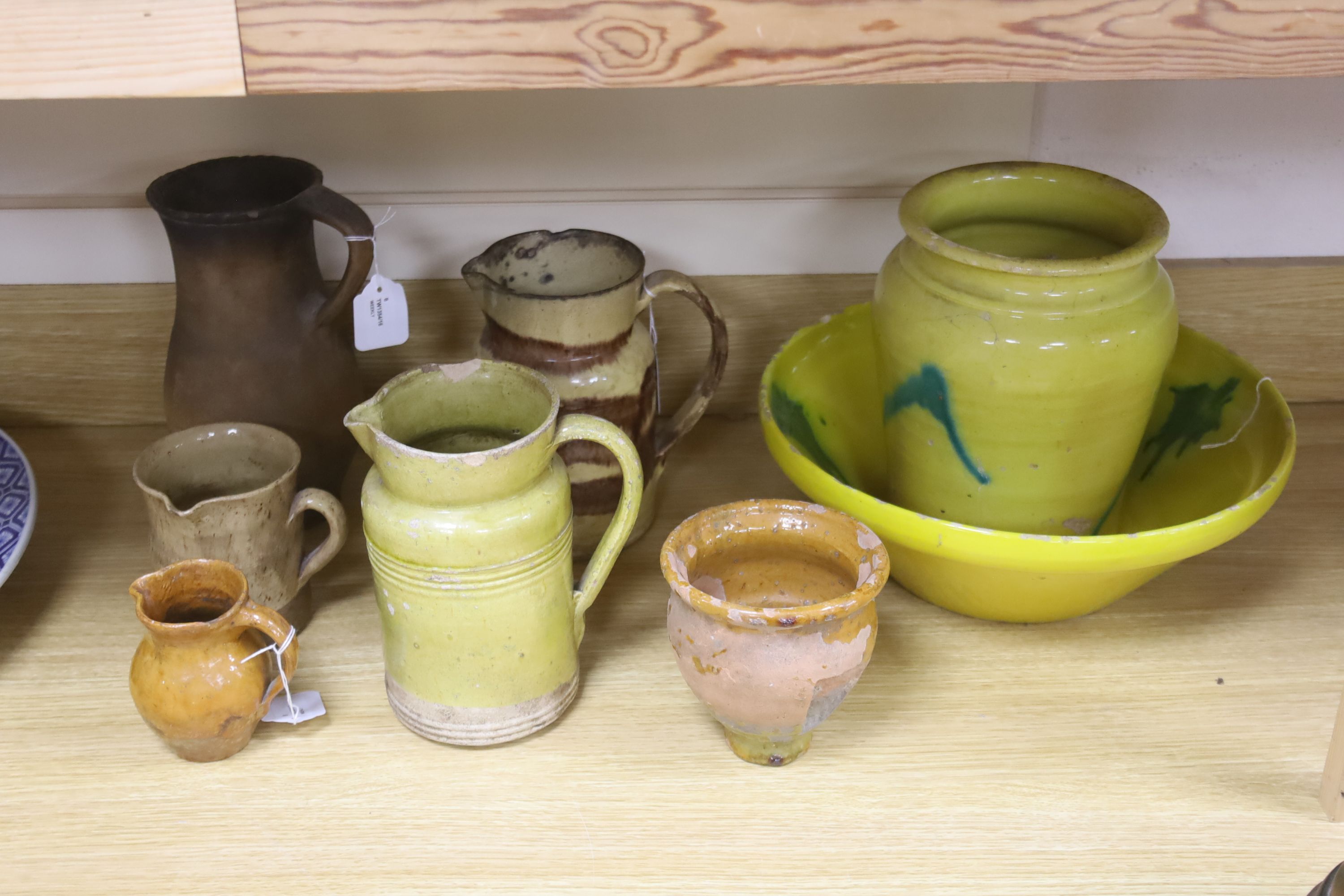 A collection of vintage French stoneware pottery, including a yellow ground bowl and matching vase, bowl 35cm